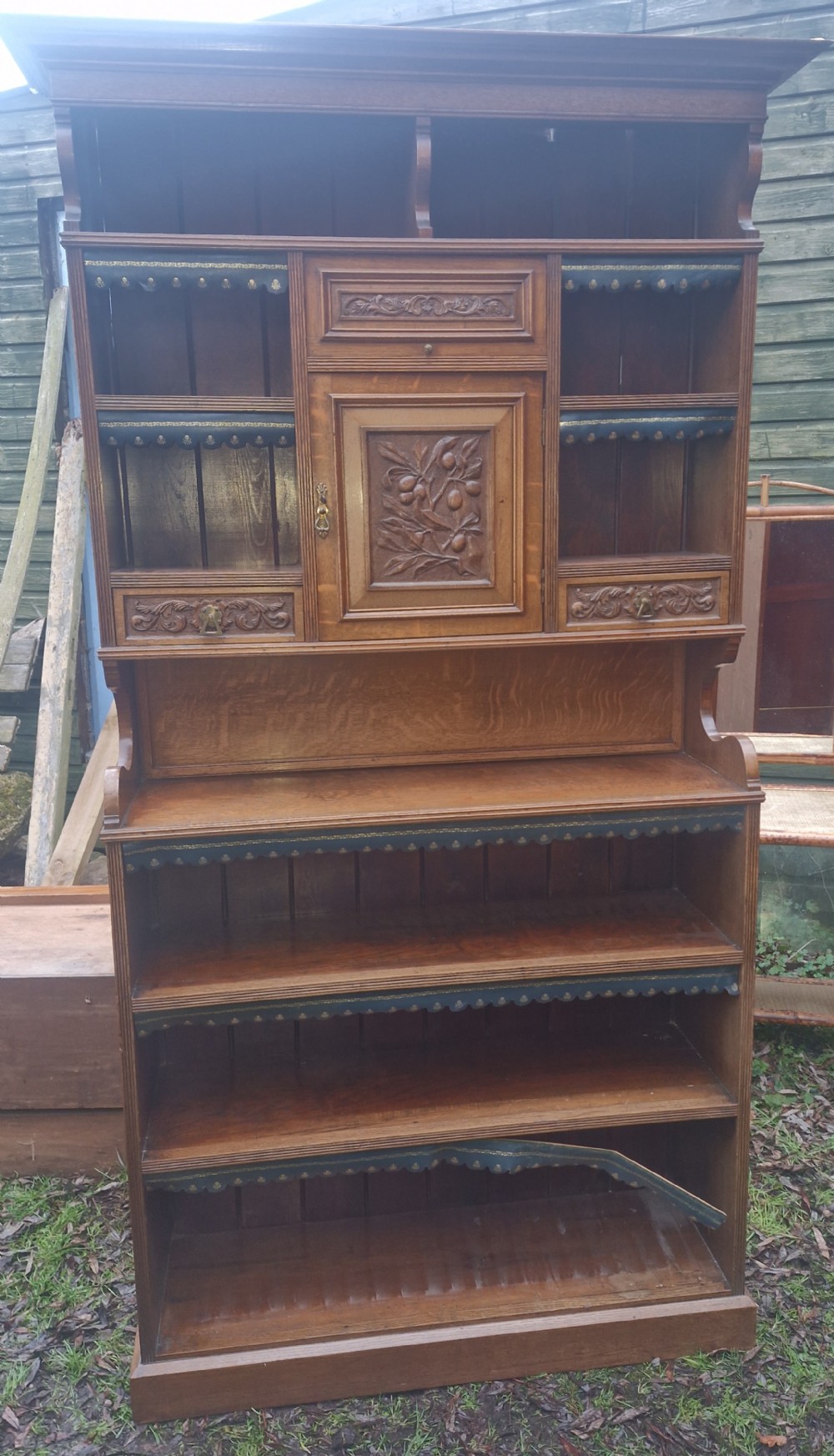 Late Victorian carved oak bookcase cabinet. 