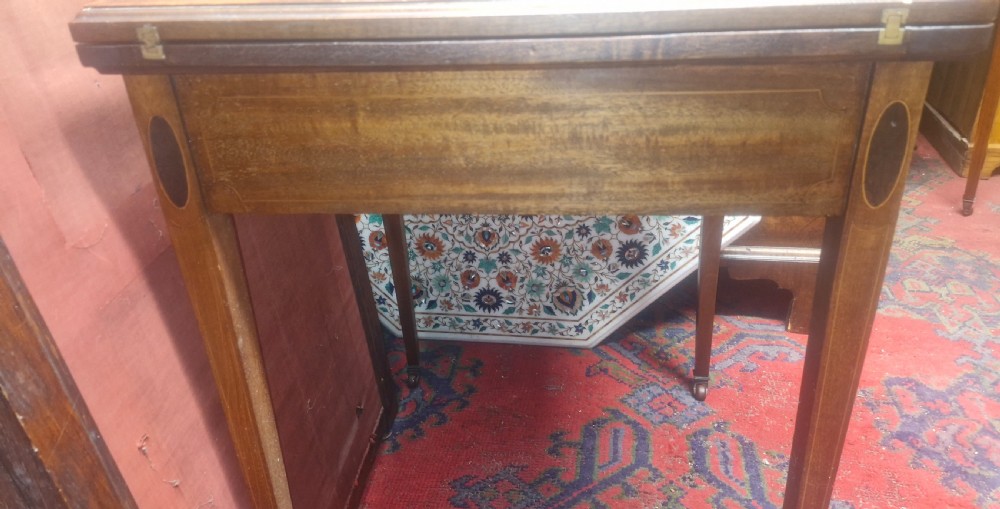 Edwardian inlaid mahogany swivel top games table.  View IV
