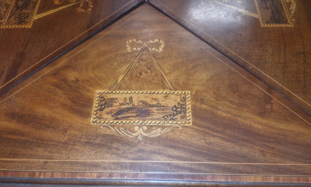 Edwardian inlaid mahogany swivel top games table.  View V