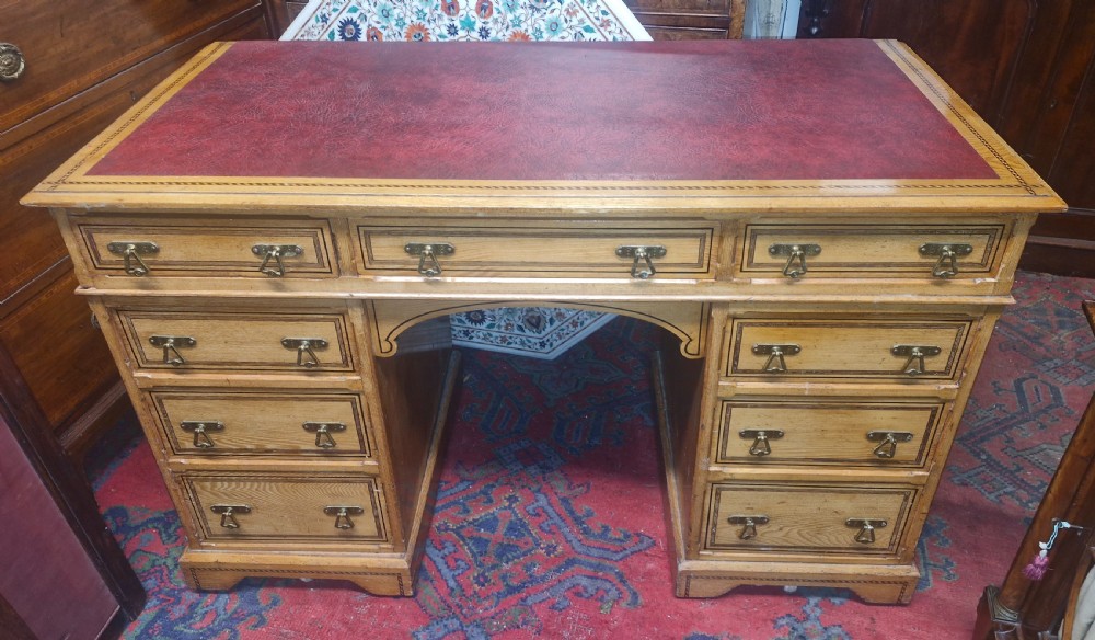 Good Victorian inlaid ash kneehole pedestal writing desk. 