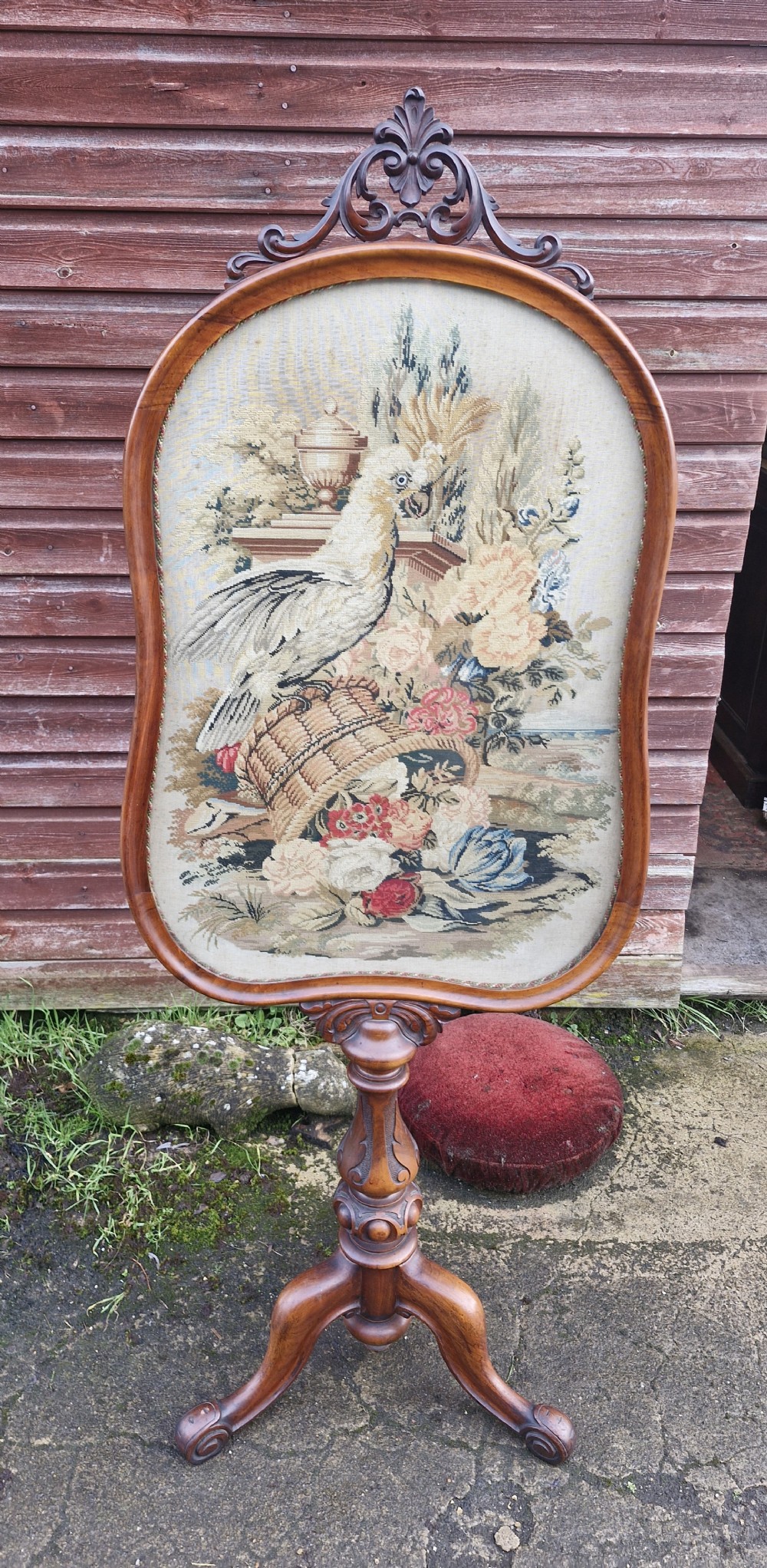 Mid 19th century walnut needlework fire screen. 