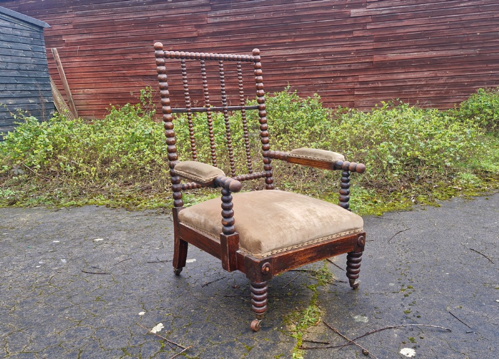 Simulated rosewood bobbin framed armchair. 