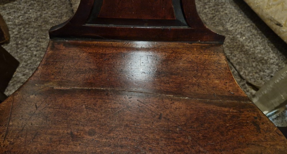 Pair of early 19th mahogany hall chairs in the style of Gillows.  View XIV