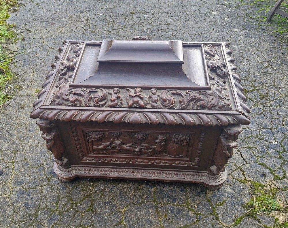 Mid 19th century carved oak wine cooler.  View III