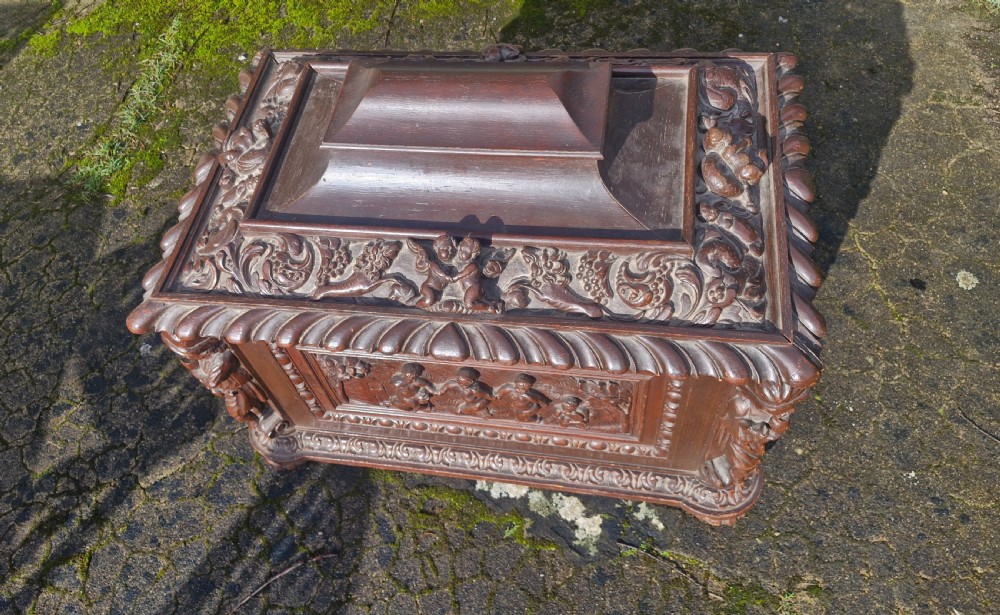 Mid 19th century carved oak wine cooler.  View XI