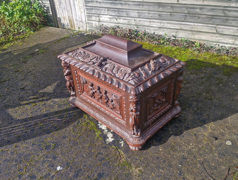 Mid 19th century carved oak wine cooler.  View XII