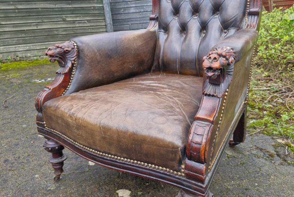 Victorian mahogany carved Lions head leather upholstered club armchair. View VI