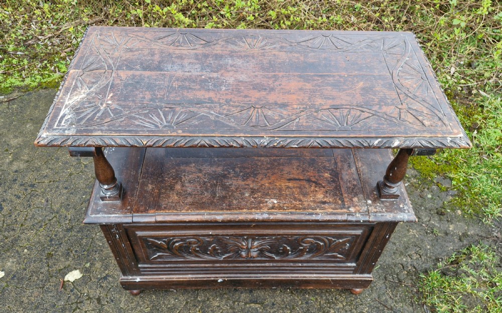 Late Victorian carved oak Green Man monks seat. View III