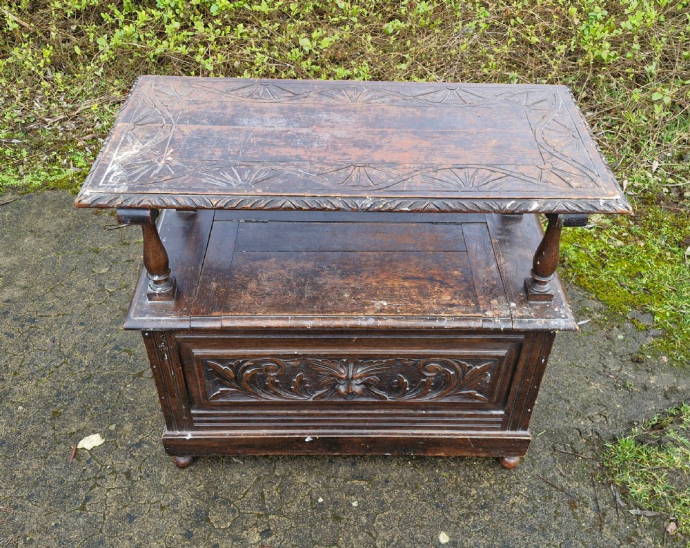 Late Victorian carved oak Green Man monks seat. View IV