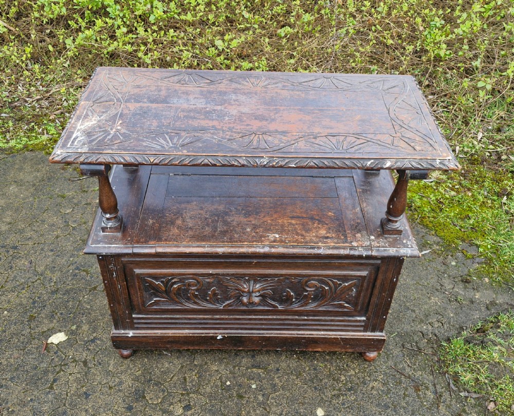 Late Victorian carved oak Green Man monks seat. View V