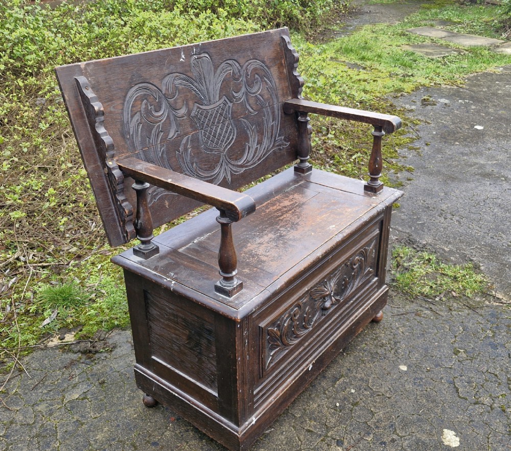 Late Victorian carved oak Green Man monks seat. View VI