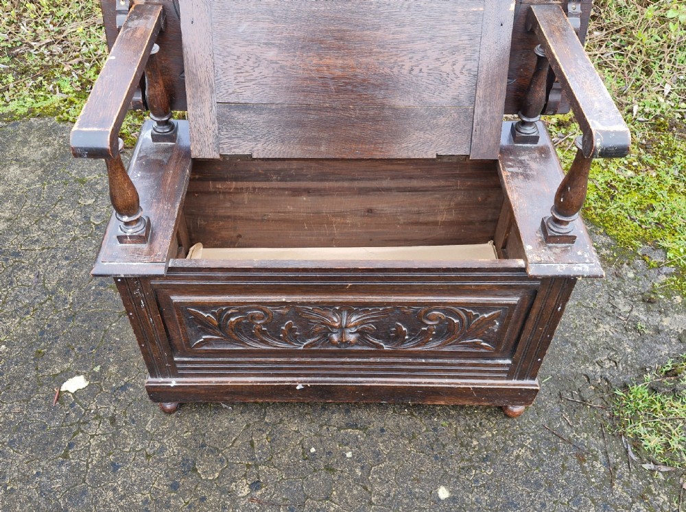 Late Victorian carved oak Green Man monks seat. View VII