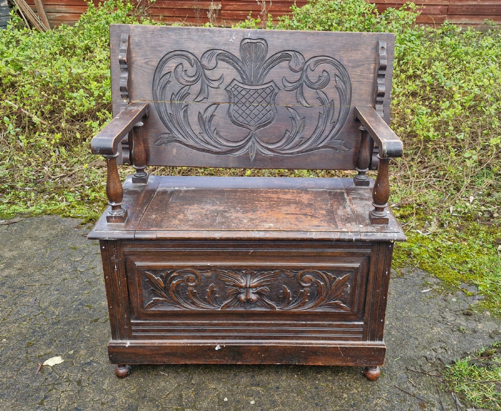 Late Victorian carved oak Green Man monks seat. View IX