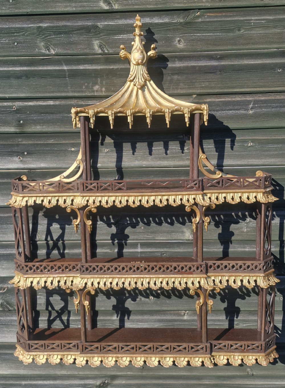 Carved and gilded Chinese Chippendale style wall shelf