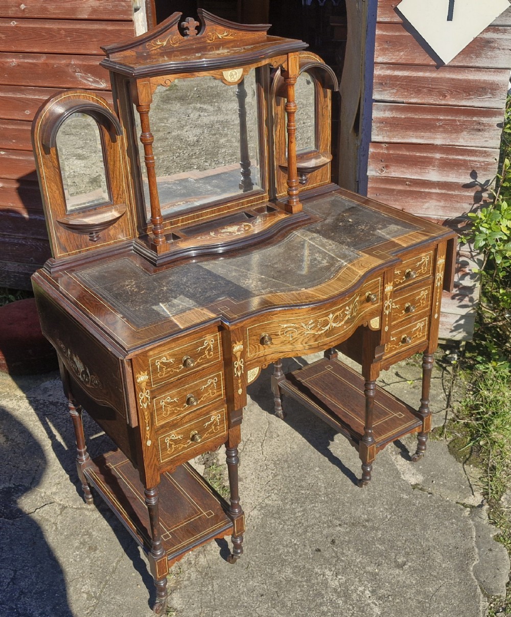 Late Victorian inlaid rosewood Ladys writing table with drop side flaps.