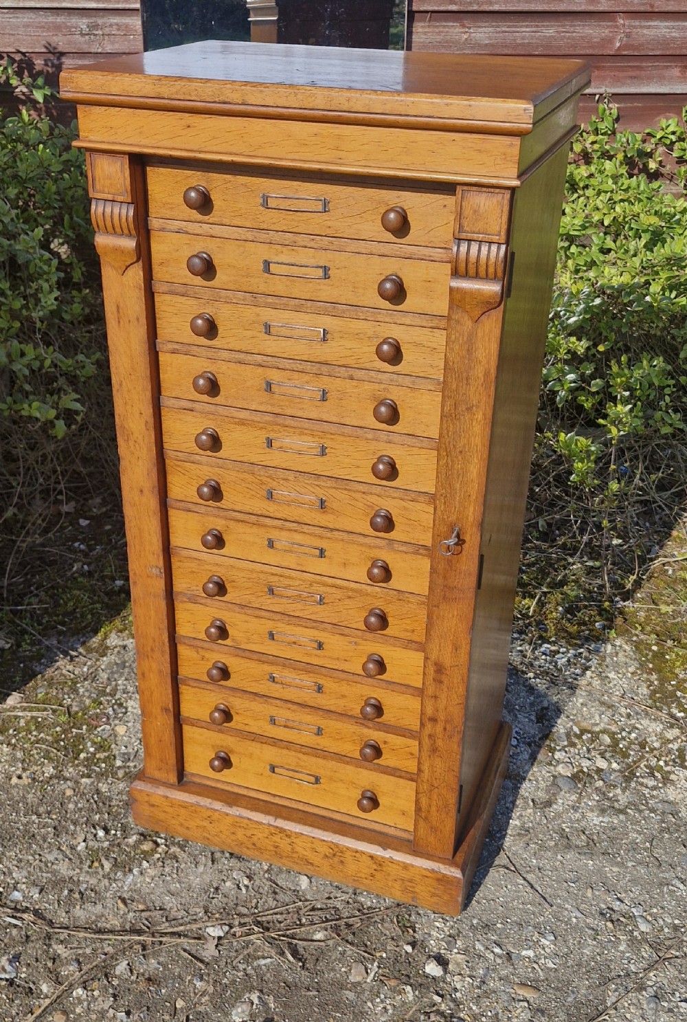 Victorian oak 12 drawer Wellington chest.