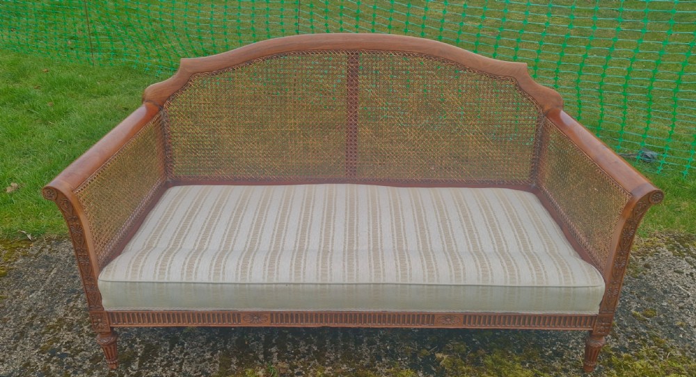 Edwardian mahogany bergere sofa. View II