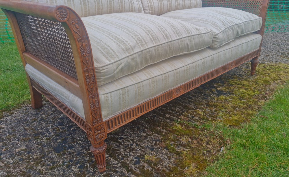 Edwardian mahogany bergere sofa. View V