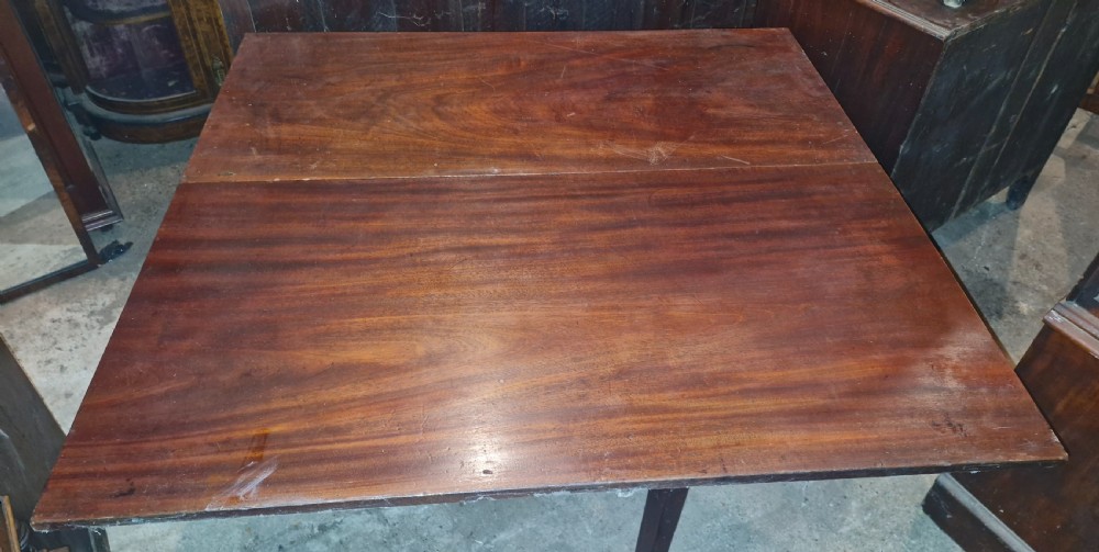 Useful and practical early 19th century mahogany drop flap dining table.  View II