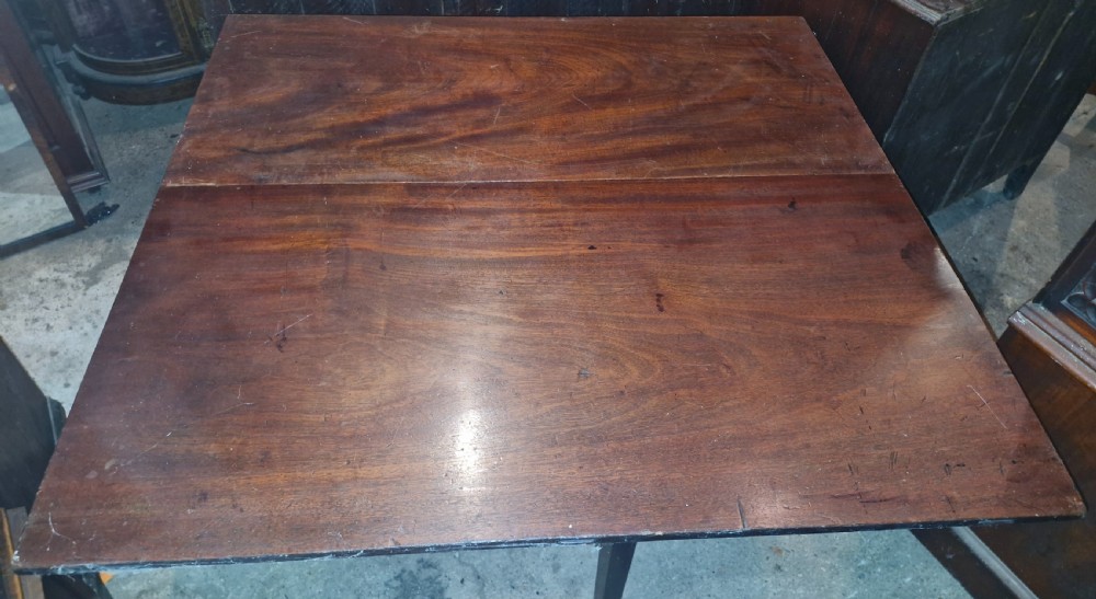 Useful and practical early 19th century mahogany drop flap dining table.  View VIII