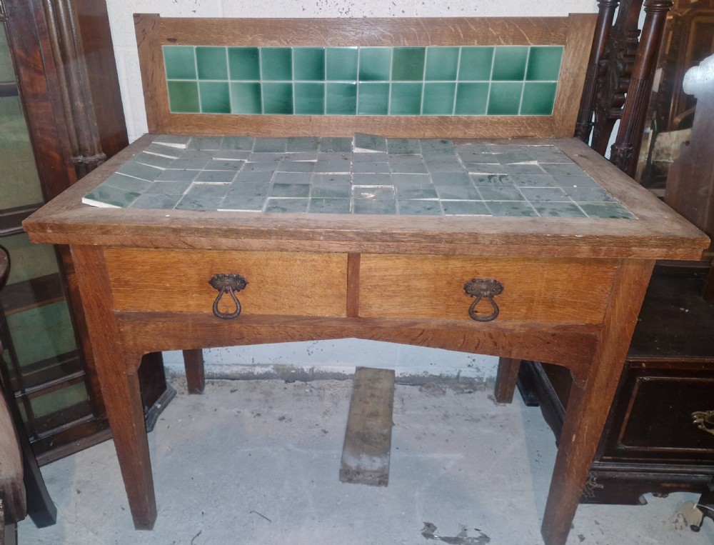 Oak arts and crafts tiled washstand in the manner of Heals.