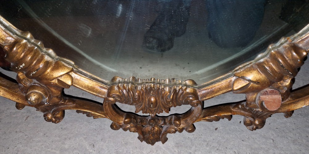 Carved gilt wood wall mirror.  View IV