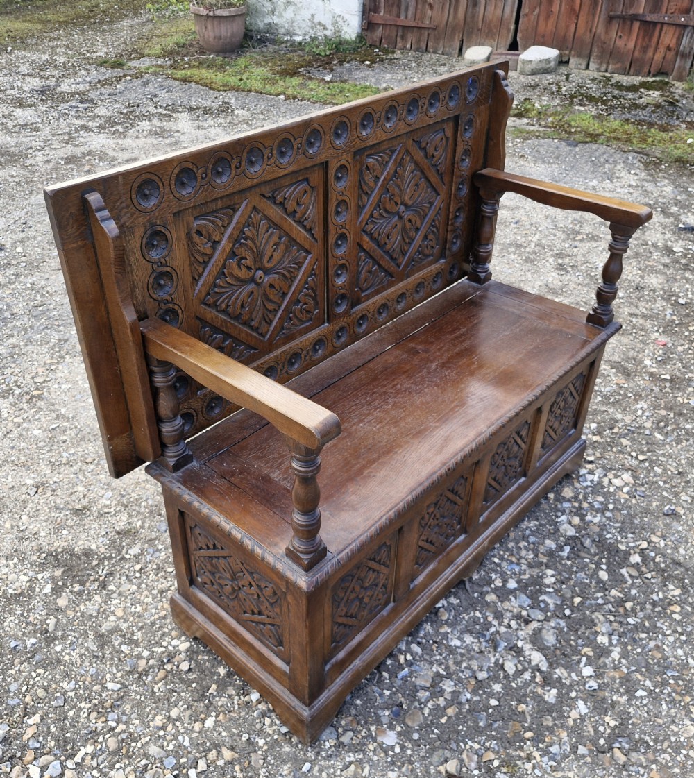 Carved oak box seat monks bench  View II