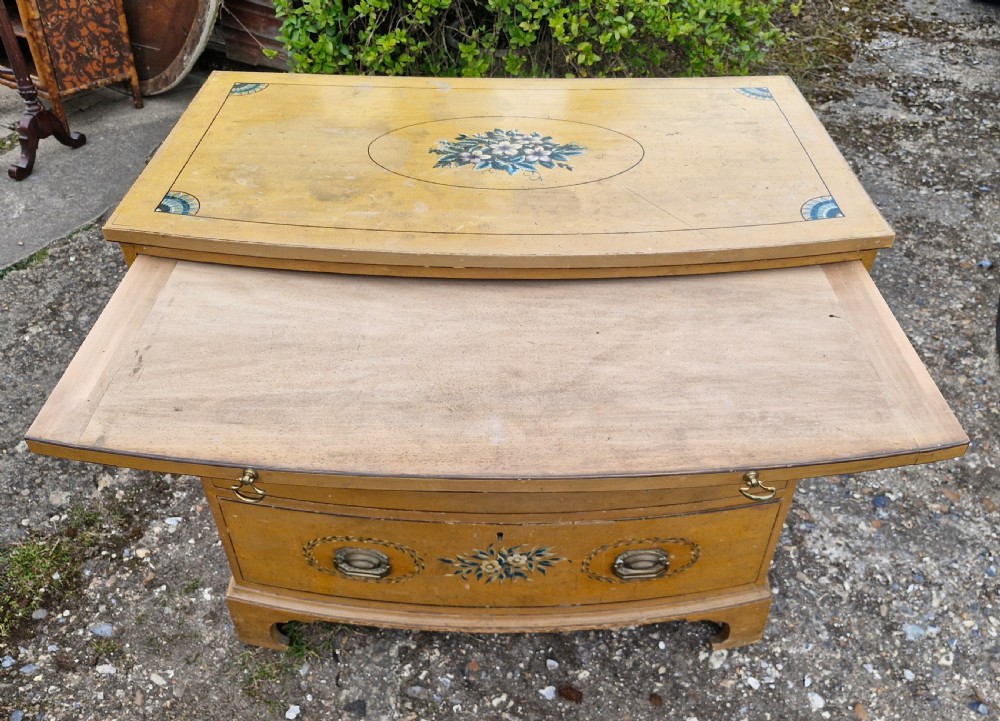 Pretty original painted bow front chest with brushing slide. View II