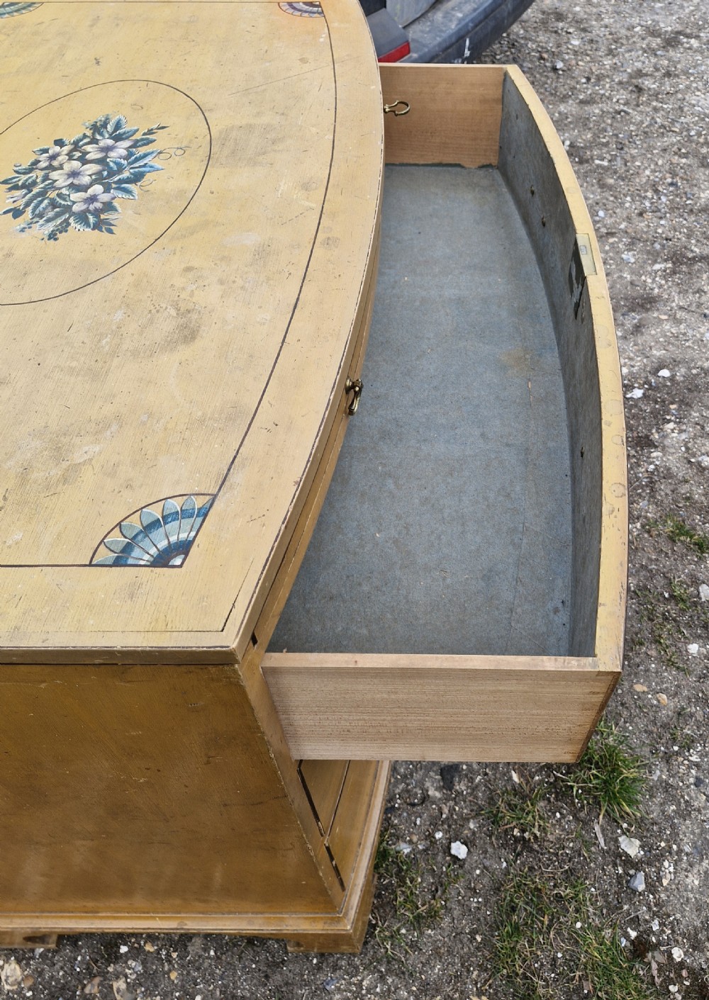 Pretty original painted bow front chest with brushing slide. View IV