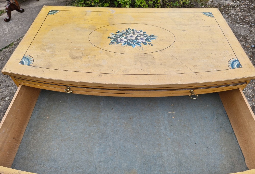 Pretty original painted bow front chest with brushing slide. View V