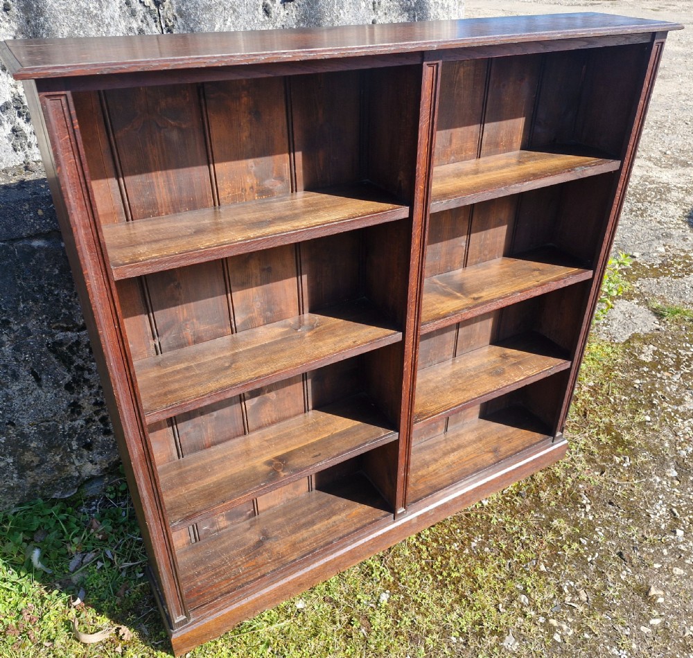 Narrow oak hallway open front bookcase.  View IV