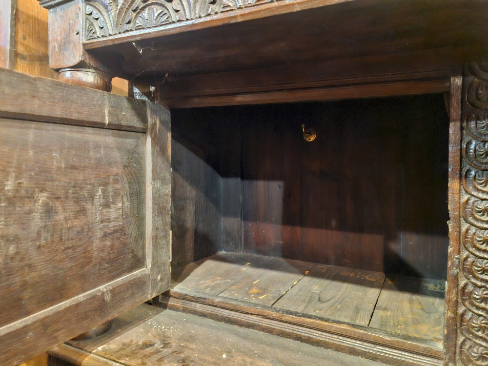 Useful antique carved oak county house hall or boot room cupboard.  View XI