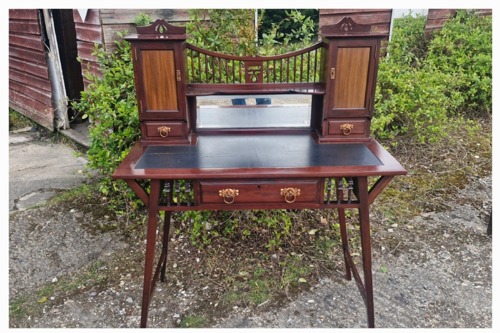 Mahogany writing table by Shapland & Petter.  View VII