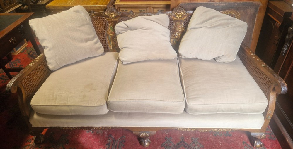Walnut and lacquered bergere sofa