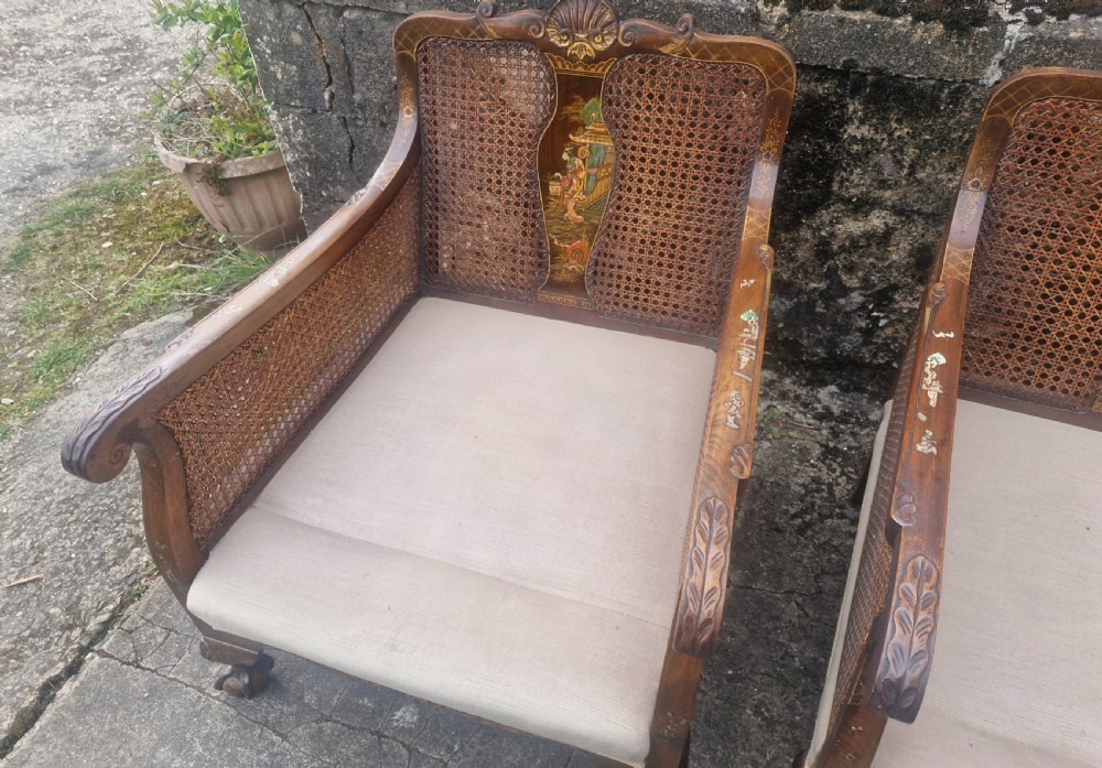 Pair of walnut and lacquered bergere armchairs.  View II