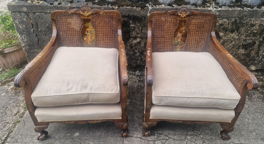 Pair of walnut and lacquered bergere armchairs.  View V