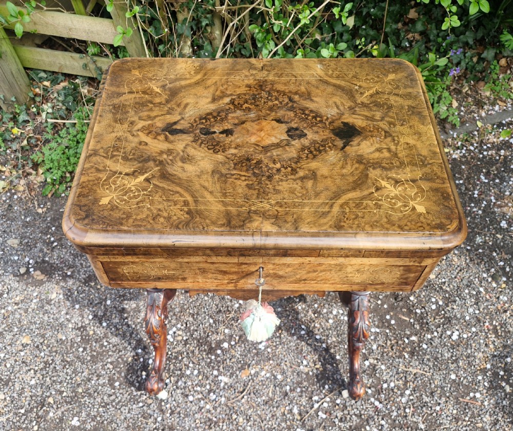 Mid Victorian walnut combined work and games table of good size. View II