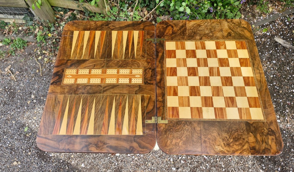 Mid Victorian walnut combined work and games table of good size. View XI