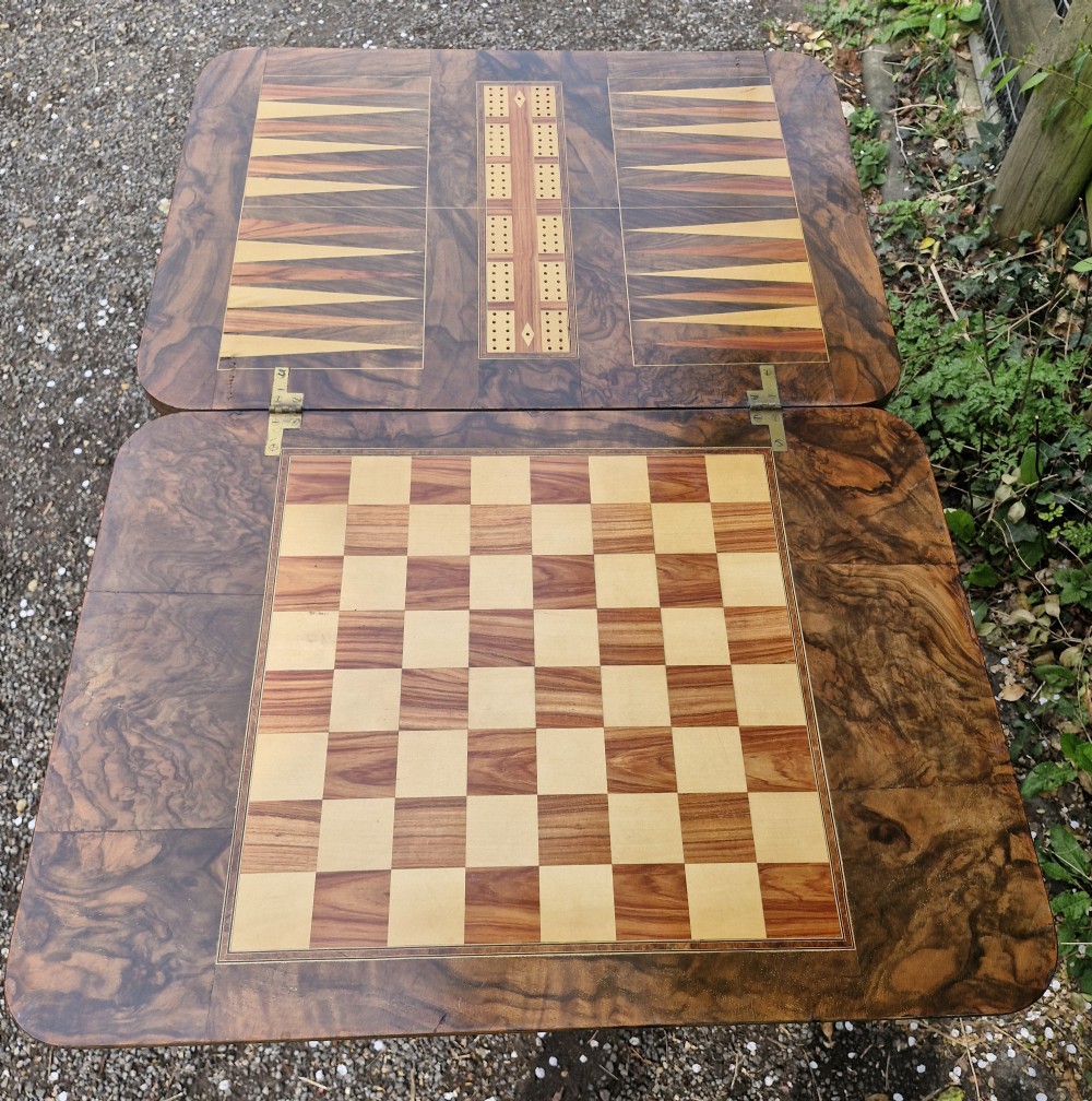 Mid Victorian walnut combined work and games table of good size. View XVI