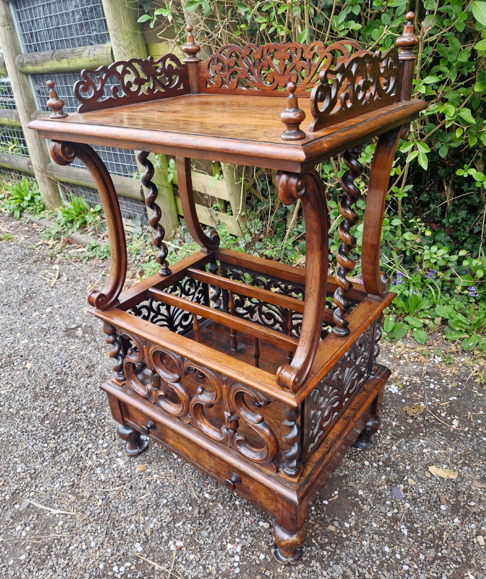 Early Victorian rosewood Canterbury whatnot. 