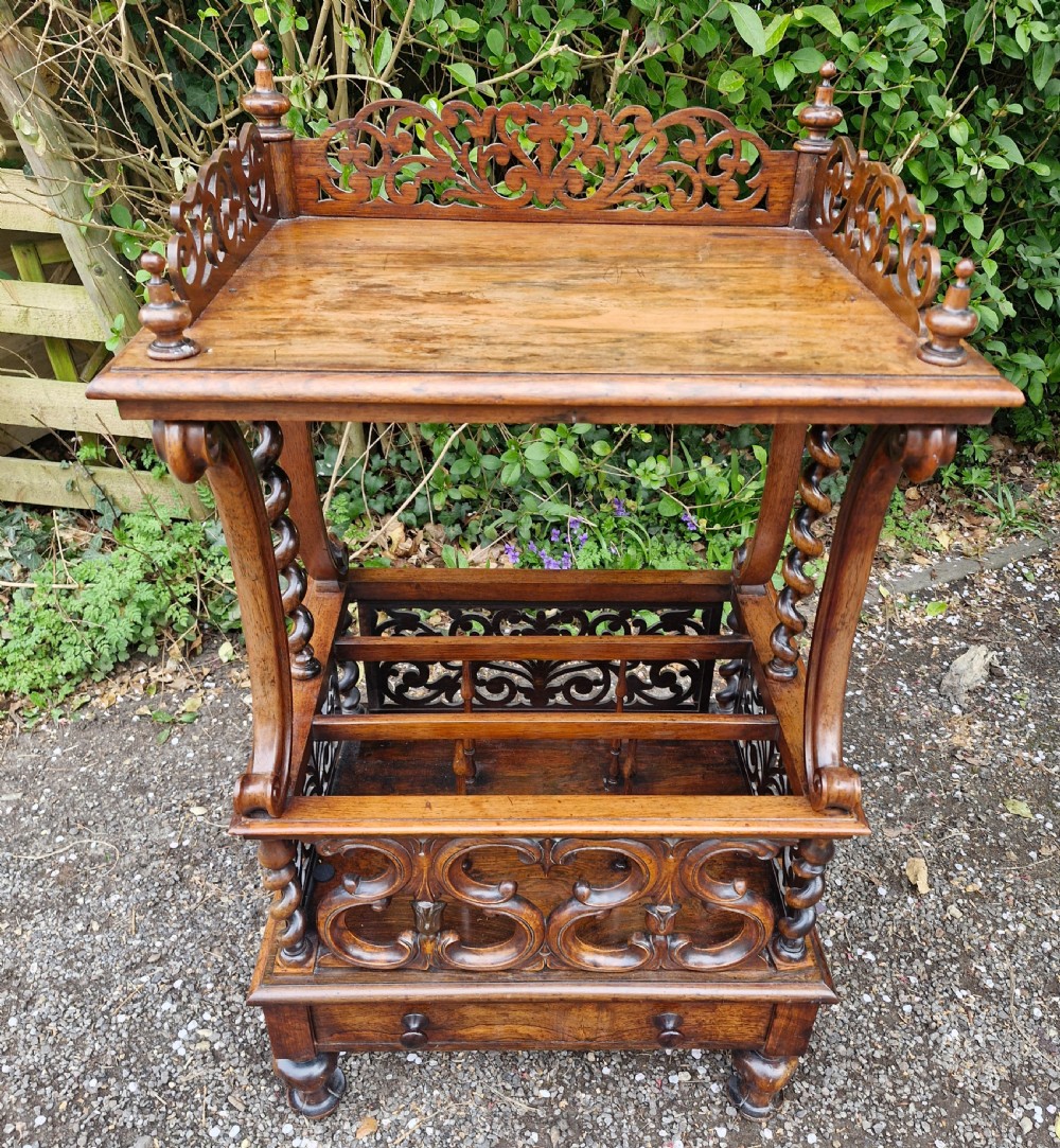Early Victorian rosewood Canterbury whatnot.  View VI