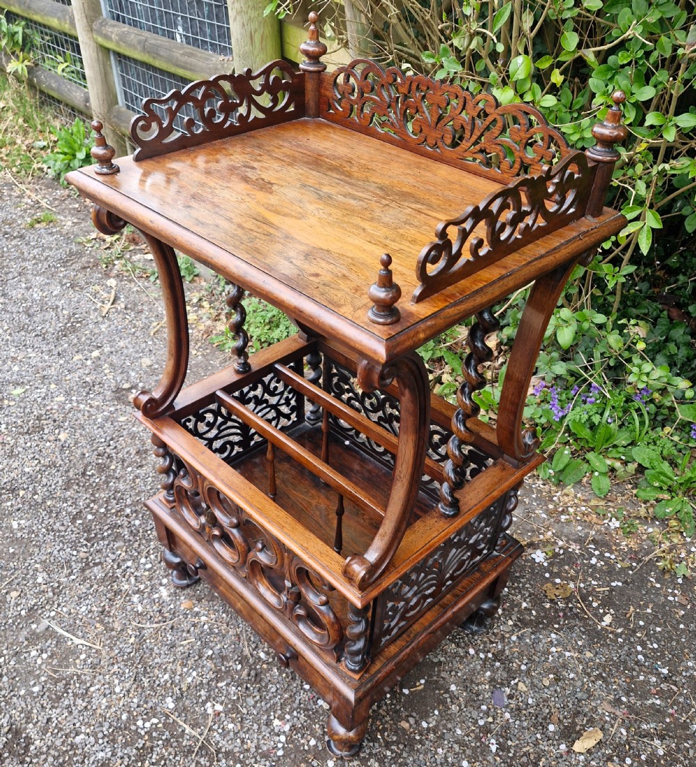 Early Victorian rosewood Canterbury whatnot.  View VII