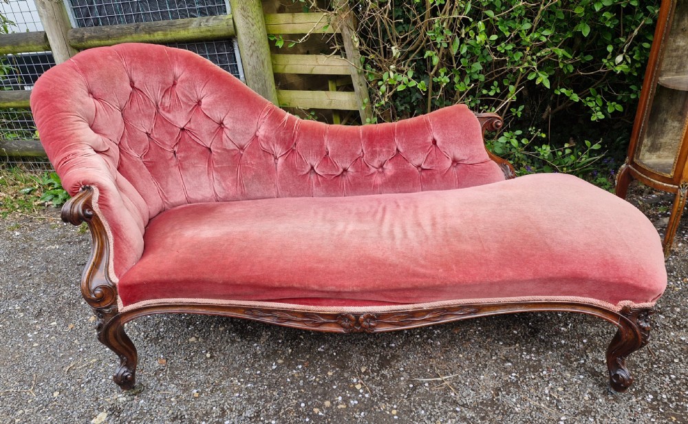 Mid 19th century rosewood upholstered chaise longue.  View II