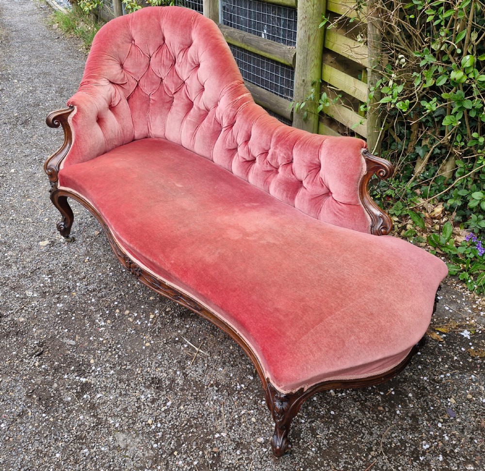 Mid 19th century rosewood upholstered chaise longue.  View III