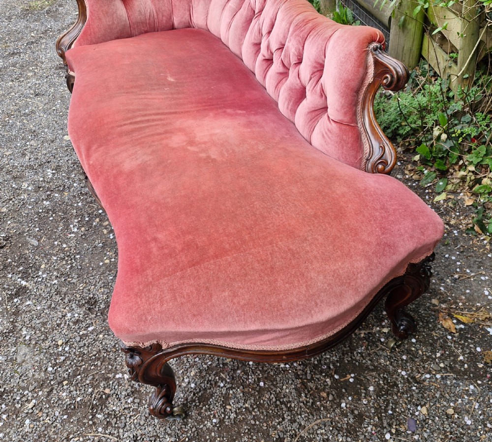 Mid 19th century rosewood upholstered chaise longue.  View IV