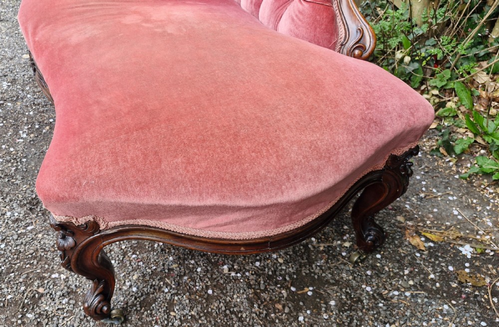 Mid 19th century rosewood upholstered chaise longue.  View V