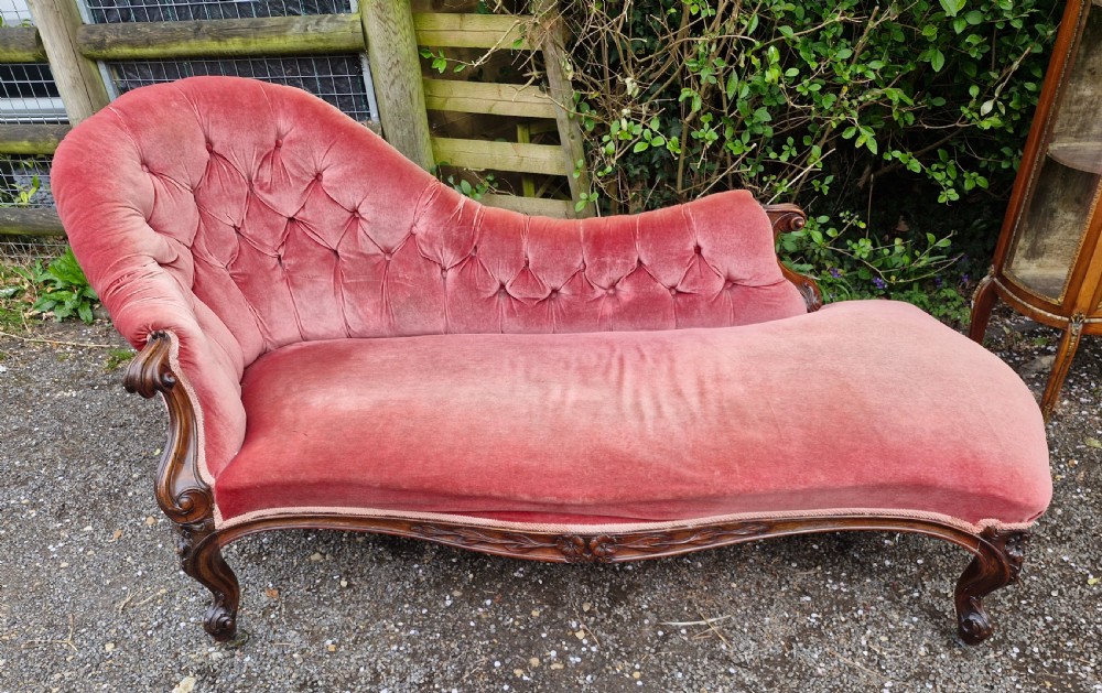 Mid 19th century rosewood upholstered chaise longue.  View VII
