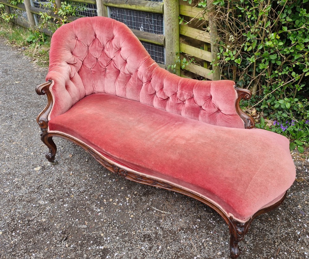 Mid 19th century rosewood upholstered chaise longue.  View IX
