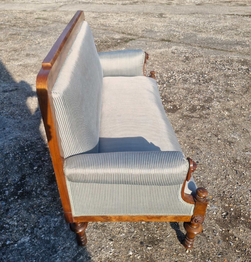 Walnut framed upholstered hall sofa. View VII