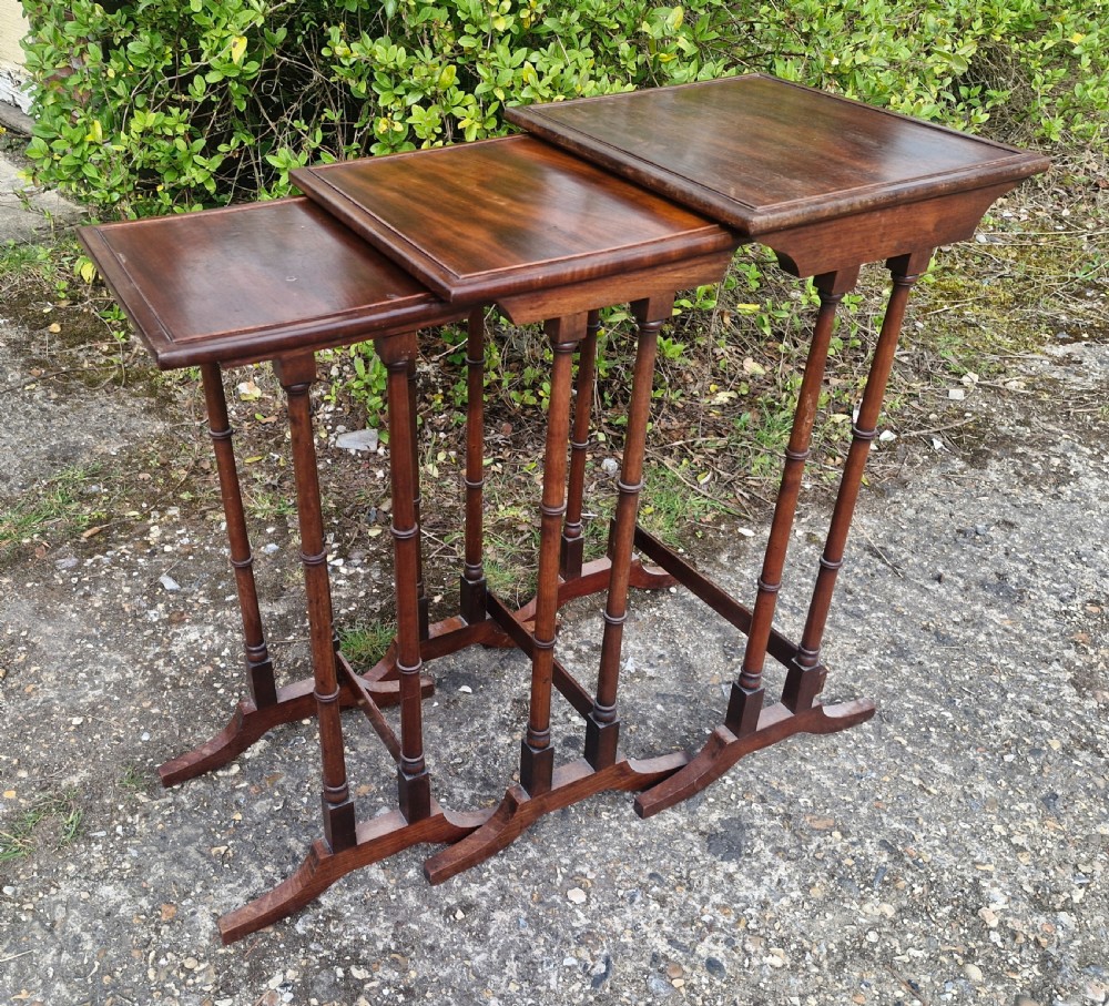 Nest of 3 Regency mahogany occasional tables. 